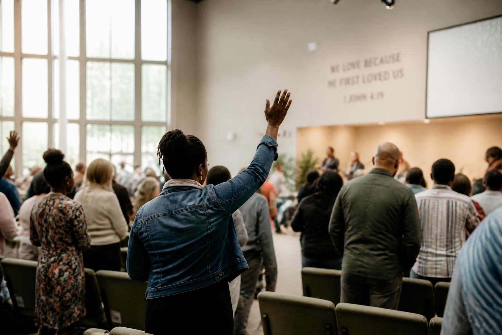 People worshipping together at a Sunday gathering